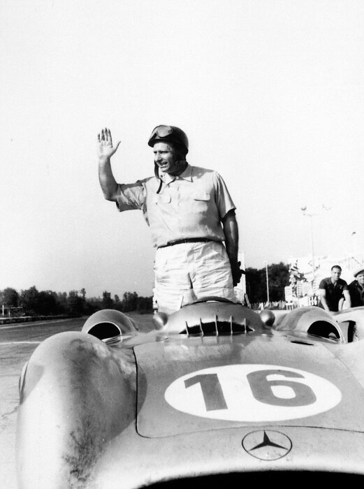 M204797 Juan Manuel Fangio and the W 196 R at the 1954 Italian Grand Prix