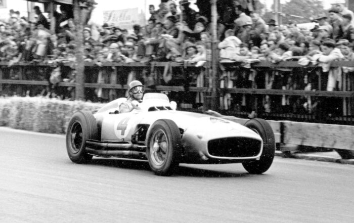 M204802 Juan Manuel Fangio driving the W 196 R at the 1954 Swiss GP
